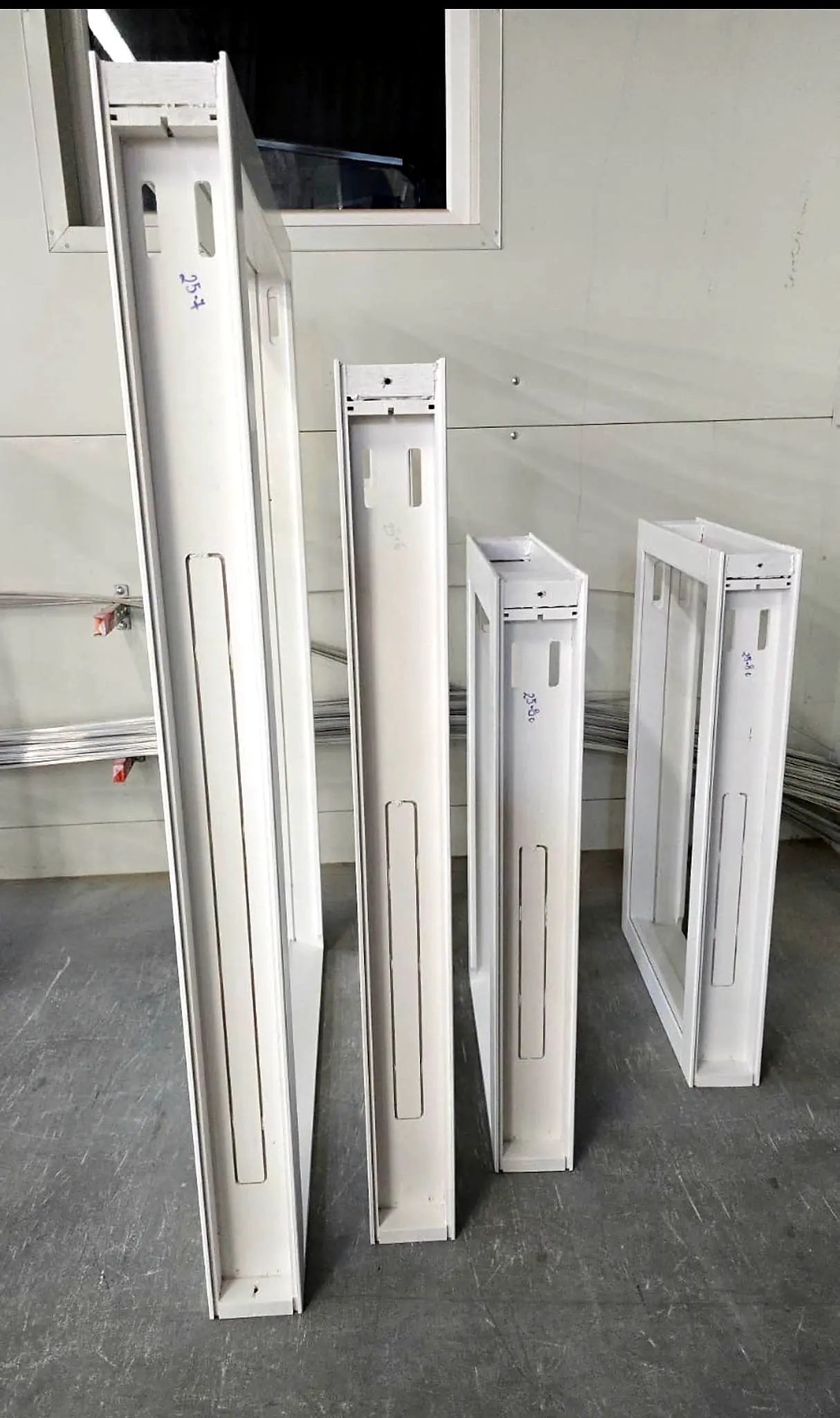 Timber frame sections in graded sizes ready for assembly