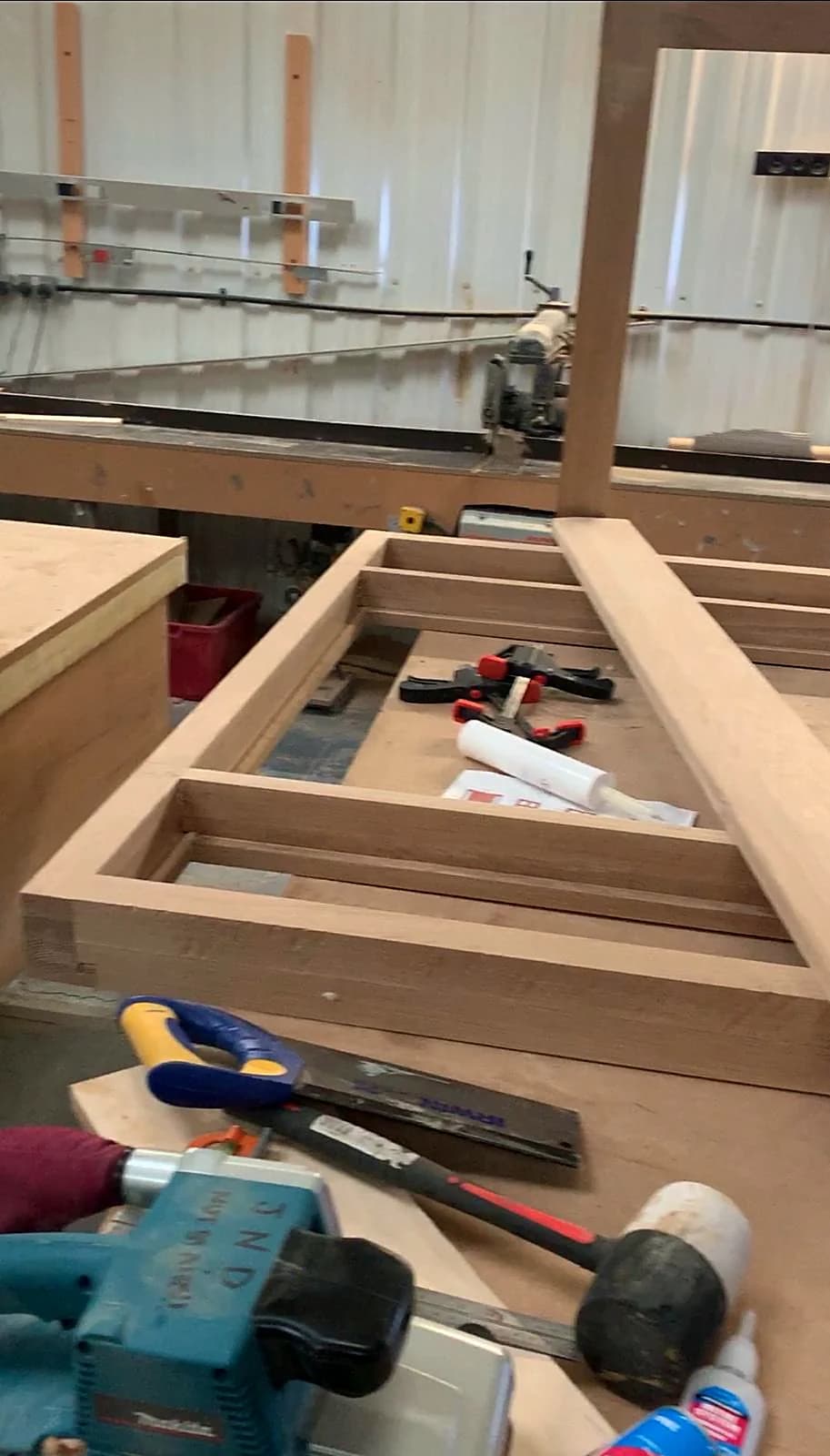 Timber joinery being worked by hand on the workshop bench